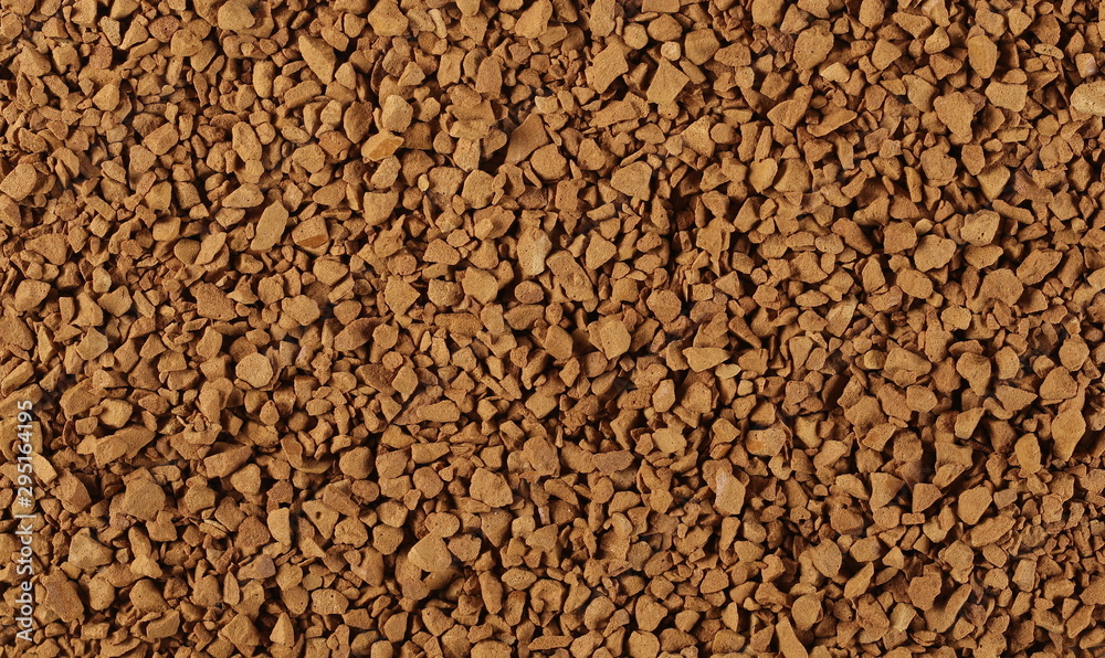 Instant coffee granules background and texture
