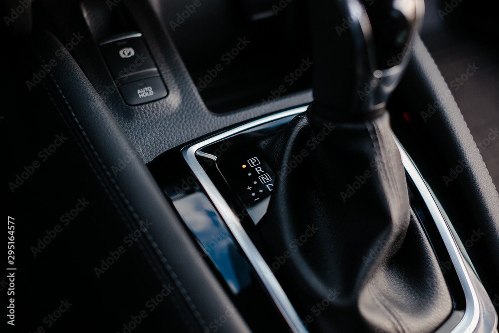 Automatic gear stick of a modern car. Automatic transmission lever shift.