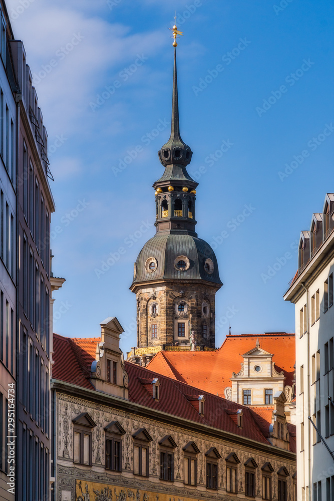 Fototapeta premium view to the famous hausmannsturm in dresden on a blue sky with some clouds in sunlight at summertime