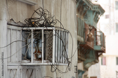 Electrical wiring at a residential area within the historic district (Al Balad) in Jeddah, Saudi Arabia photo