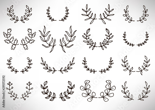 Black thin line wreath of hand drawn branches and leaves isolated on white background. Floral round frame. Laurel. Vector illustration. 