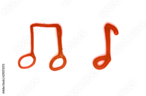 Graffiti musical notes sign sprayed on white isolated background