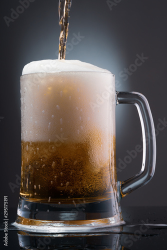 glass of beer with foam