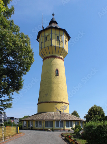 Historical yellow water tower in Kirchberg city, Germany photo