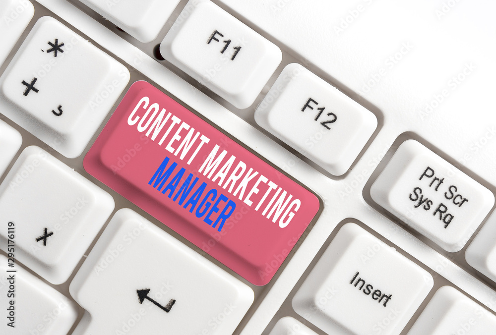 Text sign showing Content Marketing Manager. Business photo showcasing who is responsible for writing posts and slogan White pc keyboard with empty note paper above white background key copy space Text sign showing Content Marketing Manager. Business photo showcasing who is responsible for writing posts and slogan White pc keyboard with empty note paper above white background key copy space