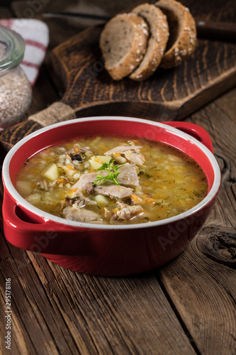 Barley soup with vegetables and chicken.