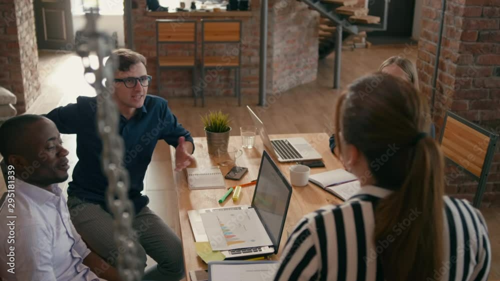 Casual Diverse Team Applauds to Asian Female Leader or Manager in Startup Loft Office. Happy People Celebrating Business Success by High Five. 4K Gimbal Orbit Medium Corporate Shot in Slow Motion