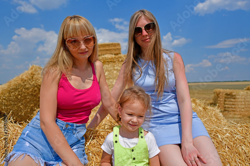 Family photo shoot in the hayloft, village Maryanovka Ukraine. photo