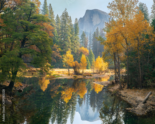 Fototapeta Naklejka Na Ścianę i Meble -  Fall Season in Yosemite Valley with Half Dome reflection