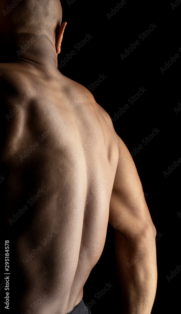 Male dancer with bare torso Male dancer with bare torso