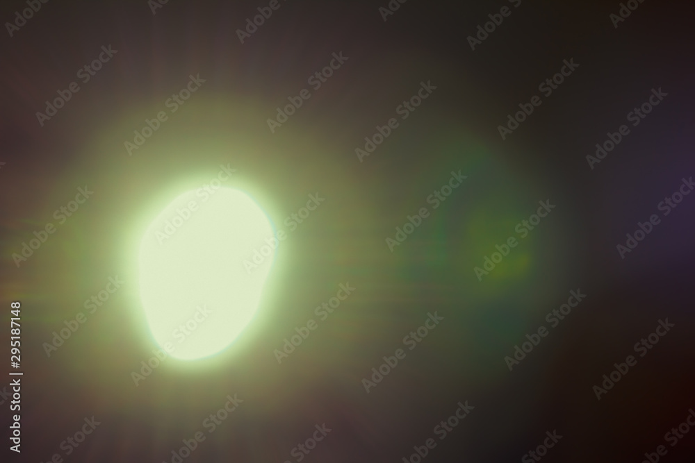 Ray of lamp spot light over black background, square stage abstract illumination