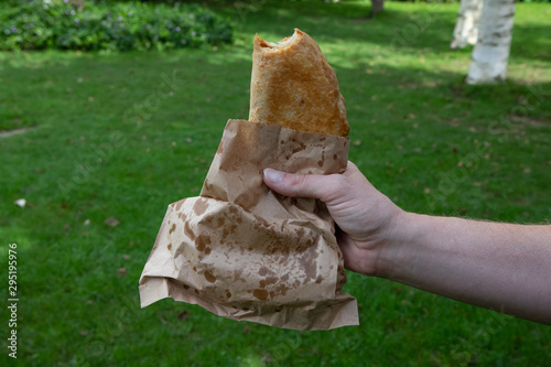 A Cornish pasty with a bite taken out of it