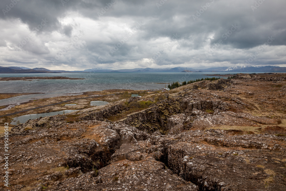 Photo of the cracked rocks in Thingvellir National Park in Iceland Photo of the cracked rocks in Thingvellir National Park in Iceland