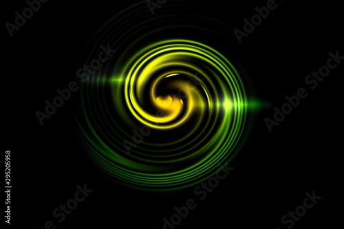 Green fire with luminous swirling on black backdrop. Glowing spiral with light circles light effect, abstract background