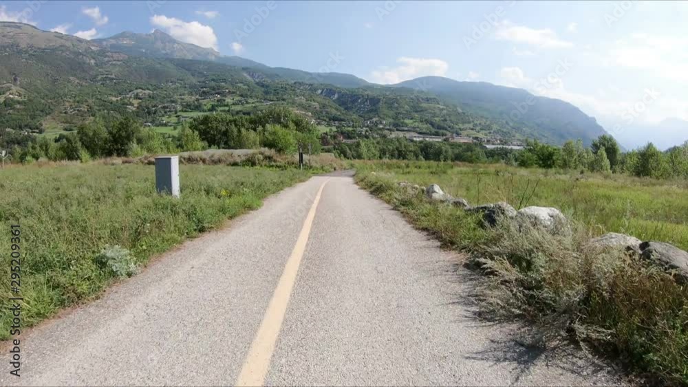 bicycle path in the countryside next to Fenis, Aosta Valley, Italy bicycle path in the countryside next to Fenis, Aosta Valley, Italy