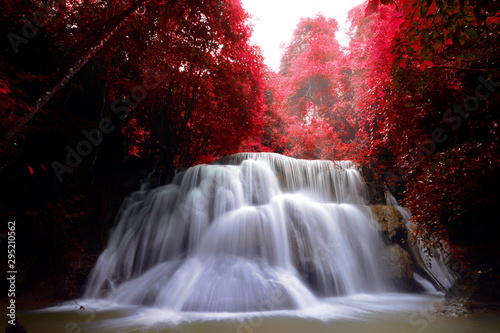 Autumn season of Waterfall in deep forest Huai Mae Khamin Waterfall , Kanchanaburi Thailand is popular with waterfall tourists . 