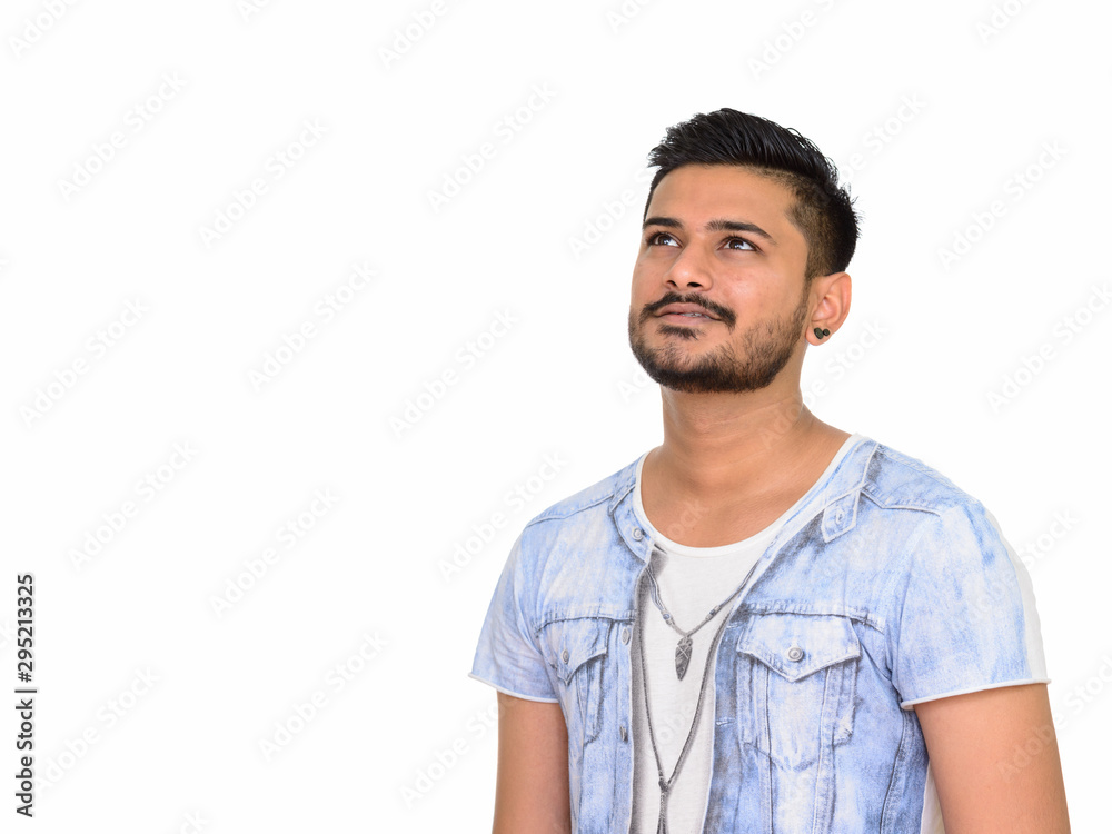 Studio portrait of handsome Indian man with beard Studio portrait of handsome Indian man with beard