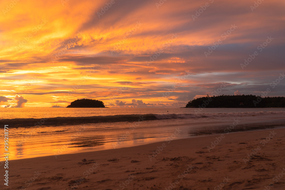 Kata Beach is a beautiful beach with white sand and smooth waves perfect for relaxing and swimming.. There is a unique Pu island close to Kata beach. Kata Beach is a beautiful beach with white sand and smooth waves perfect for relaxing and swimming.. There is a unique Pu island close to Kata beach.
