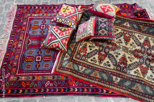 Street bazaar of ancient oriental handmade Garabagh, Tabriz, Shirvan style carpets, rugs at Old Town Baku, Azerbaijan photo