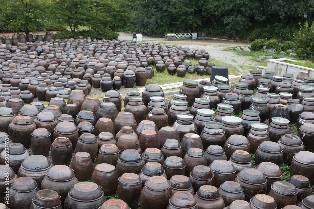 Platform for crocks of sauces and condiments, South Korea. Platform for crocks of sauces and condiments, South Korea.