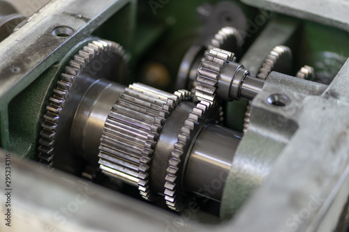Preventive machine maintenance and retrofit in machine shop.Spindle shaft gear and bearing, parts in head stock of lathe machine.