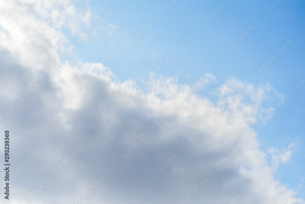 Beautiful puffy clouds isolated against blue skies