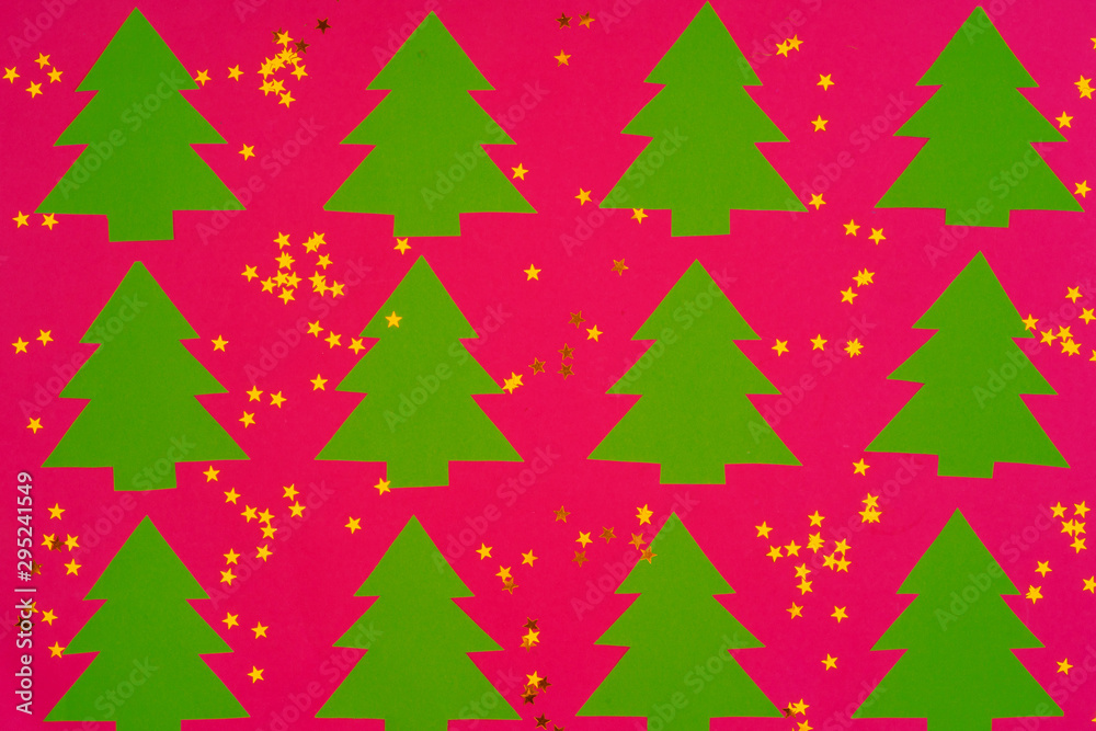 Pink background with Christmas holiday decorations pattern Pink background with Christmas holiday decorations pattern
