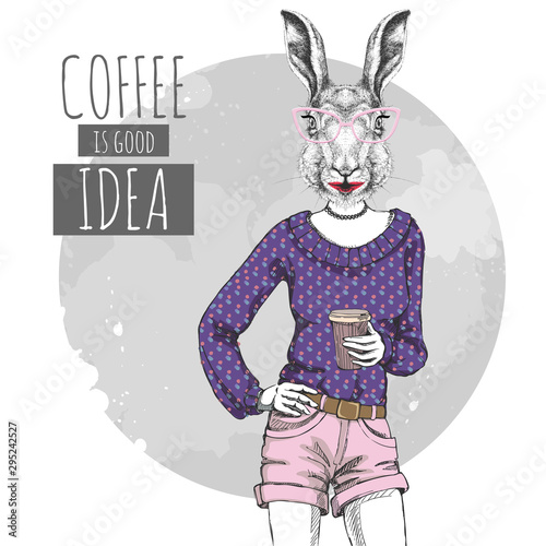 Retro Hipster fashion animal rabbit with coffee. Woman model