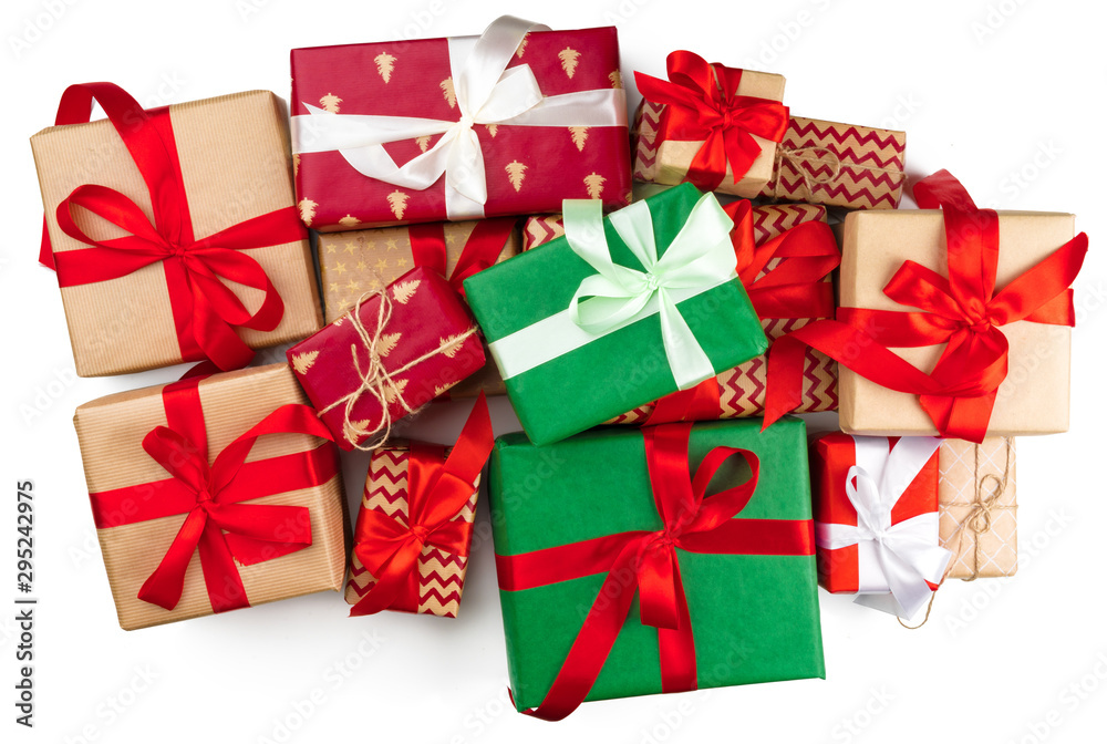 Fototapeta premium Top view of pile of christmas gifts on white background