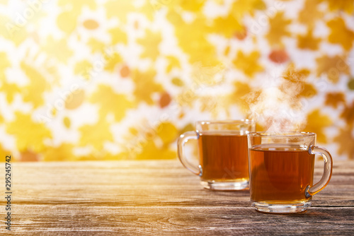 Couple cups of black tea on wooden table,with copy space.