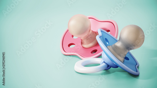 Pacifiers standing on green background. 3D illustration photo