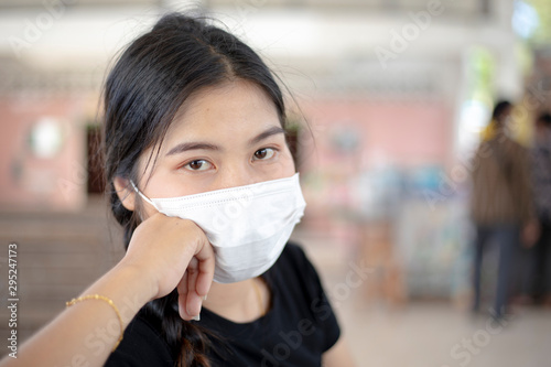 Women wearing masks to protect against germs and air pollution.