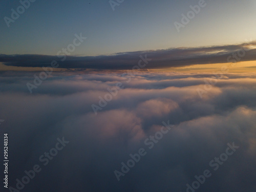 View above clouds during sunrise. Dramatic view the sky.