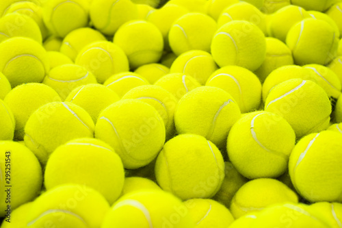 Lots of vibrant tennis balls, pattern of new tennis balls for background © gargantiopa