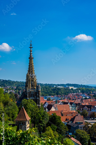 Germany, Skyline of medieval city esslingen am neckar with church frauenkirche above red roofs on sunny day, seen from above