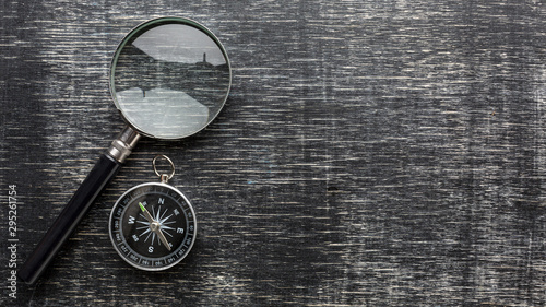 Top view magnifying glass and compass