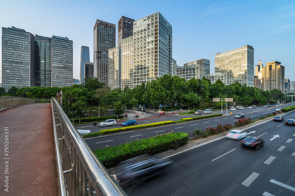 traffic on road and buildings in beijing.