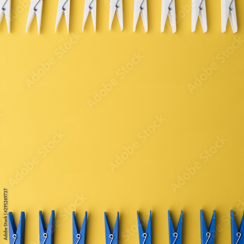 Top view clothespin with yellow background