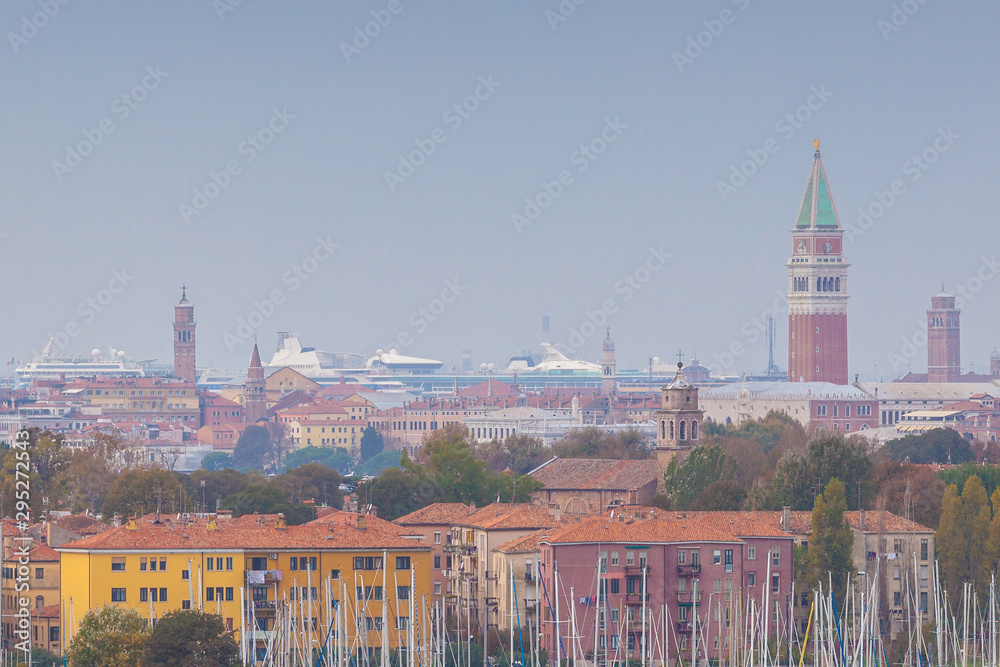 Venice view with large cruise ships docked in the harbor in the background, Venice, Italy Venice view with large cruise ships docked in the harbor in the background, Venice, Italy