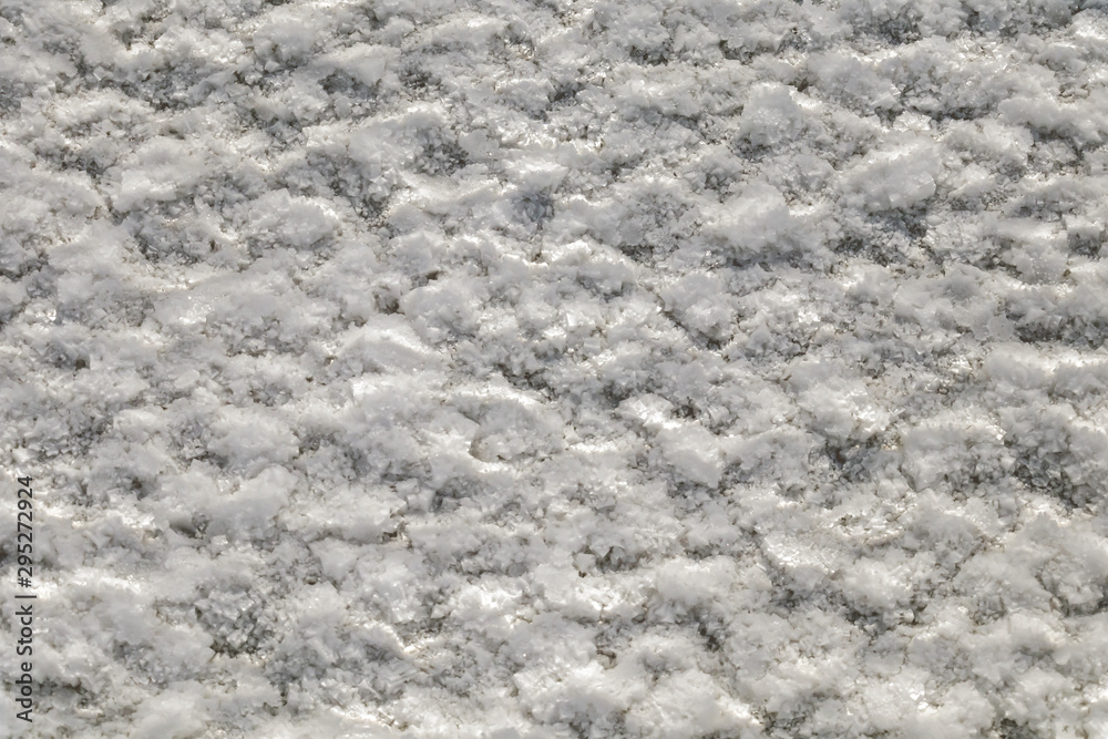 Obraz premium Salt crystals on the salty surface of desert close up. Natural background with copy space