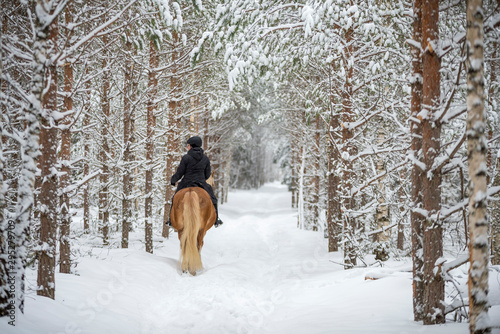 Woman horseback riding