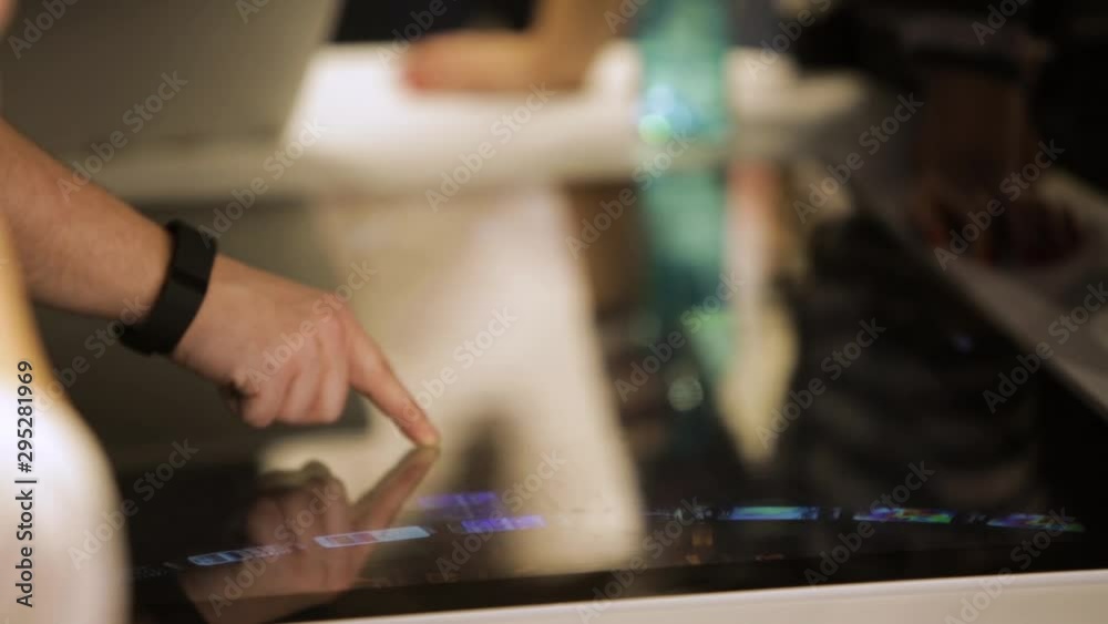 Business Professionals Meeting. Using Touchscreen Interactive Smart Table Business Professionals Meeting. Using Touchscreen Interactive Smart Table