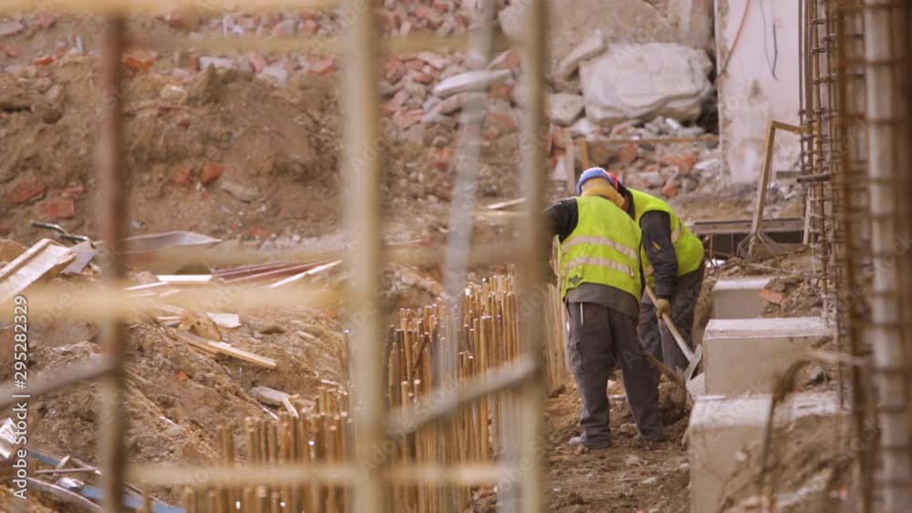 Demolition Contractors. Excavator And Workers. Rubble Piles Demolition Contractors. Excavator And Workers. Rubble Piles