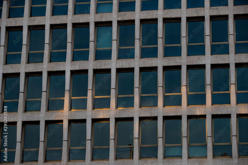 The background of the window of a multi-storey building is shot closeup. The background of the window of a multi-storey building is shot closeup.