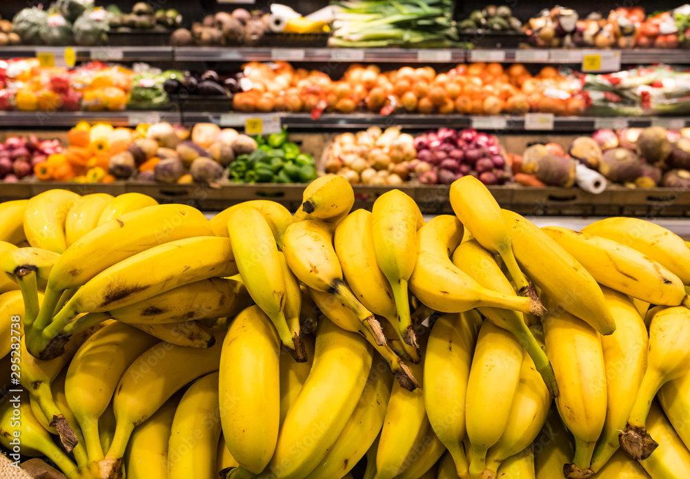Close up on ripe bananas for sale in a supermarket