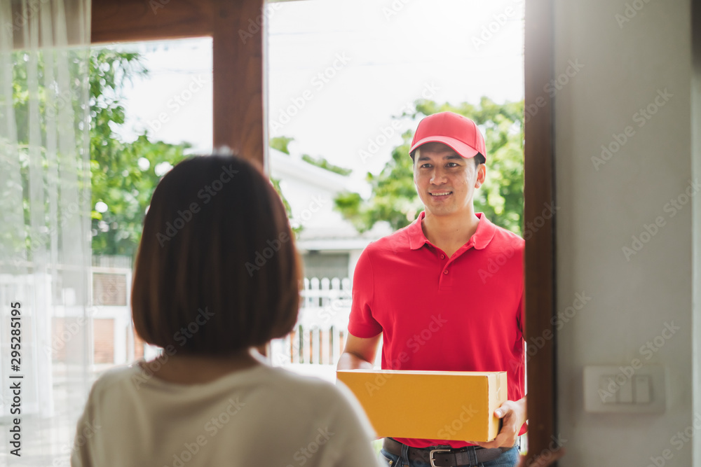Asian delivery man deliver box parcel package to customer at home, shipping delivery concept Asian delivery man deliver box parcel package to customer at home, shipping delivery concept