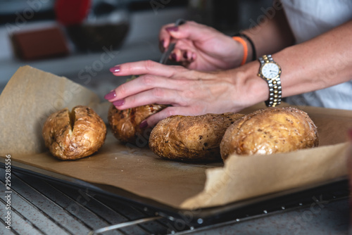 Baked stuffed potatoes in a basket