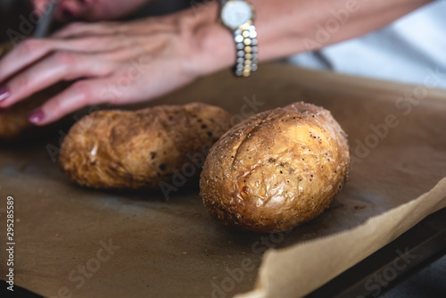 Baked stuffed potatoes in a basket