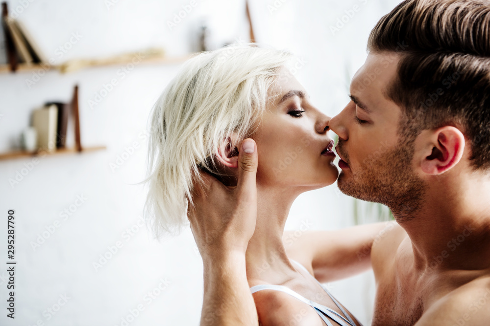 Women kissing hard