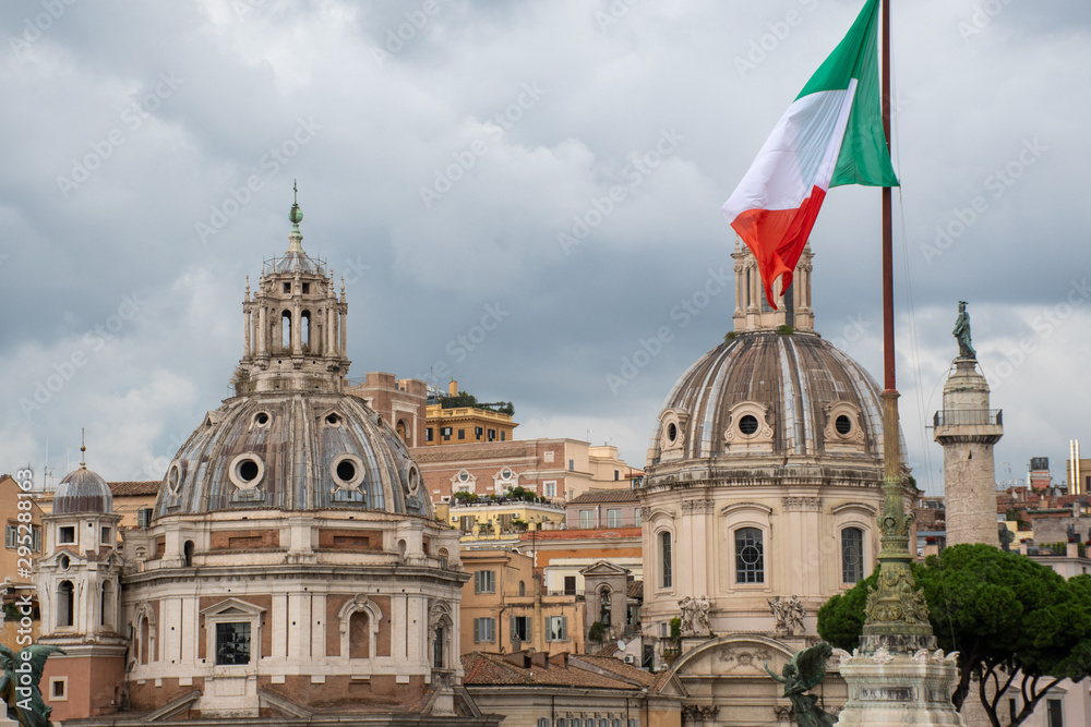 Roman Churches with Italian flag in foreground